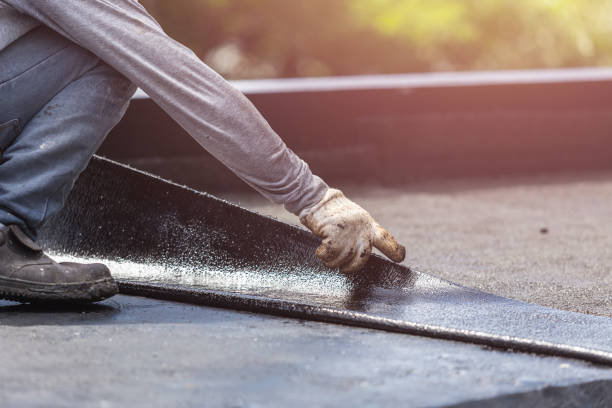 Professional Basement Waterproofing technician working in Coats, NC